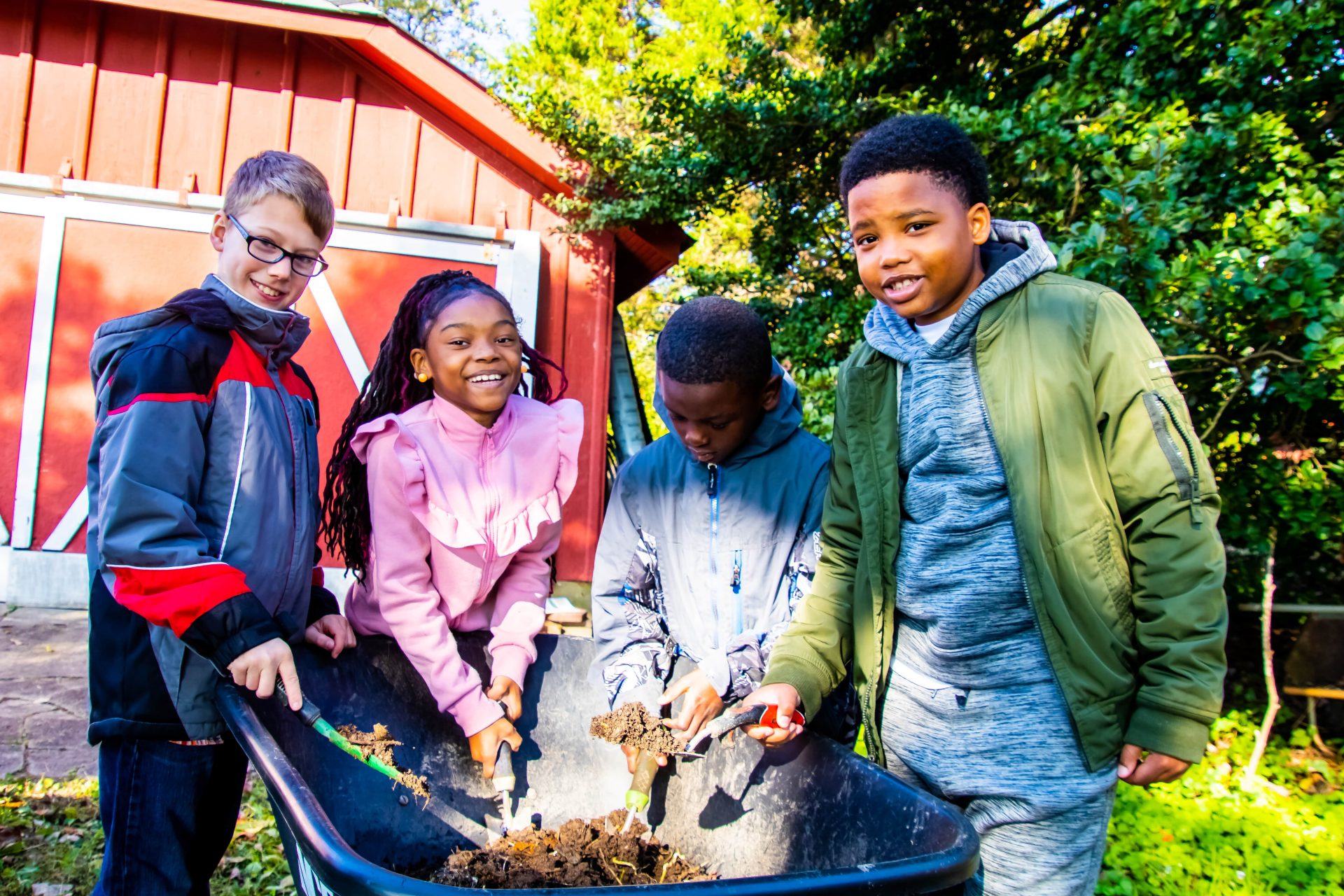 Days of Taste students with wheelbarrow of compost