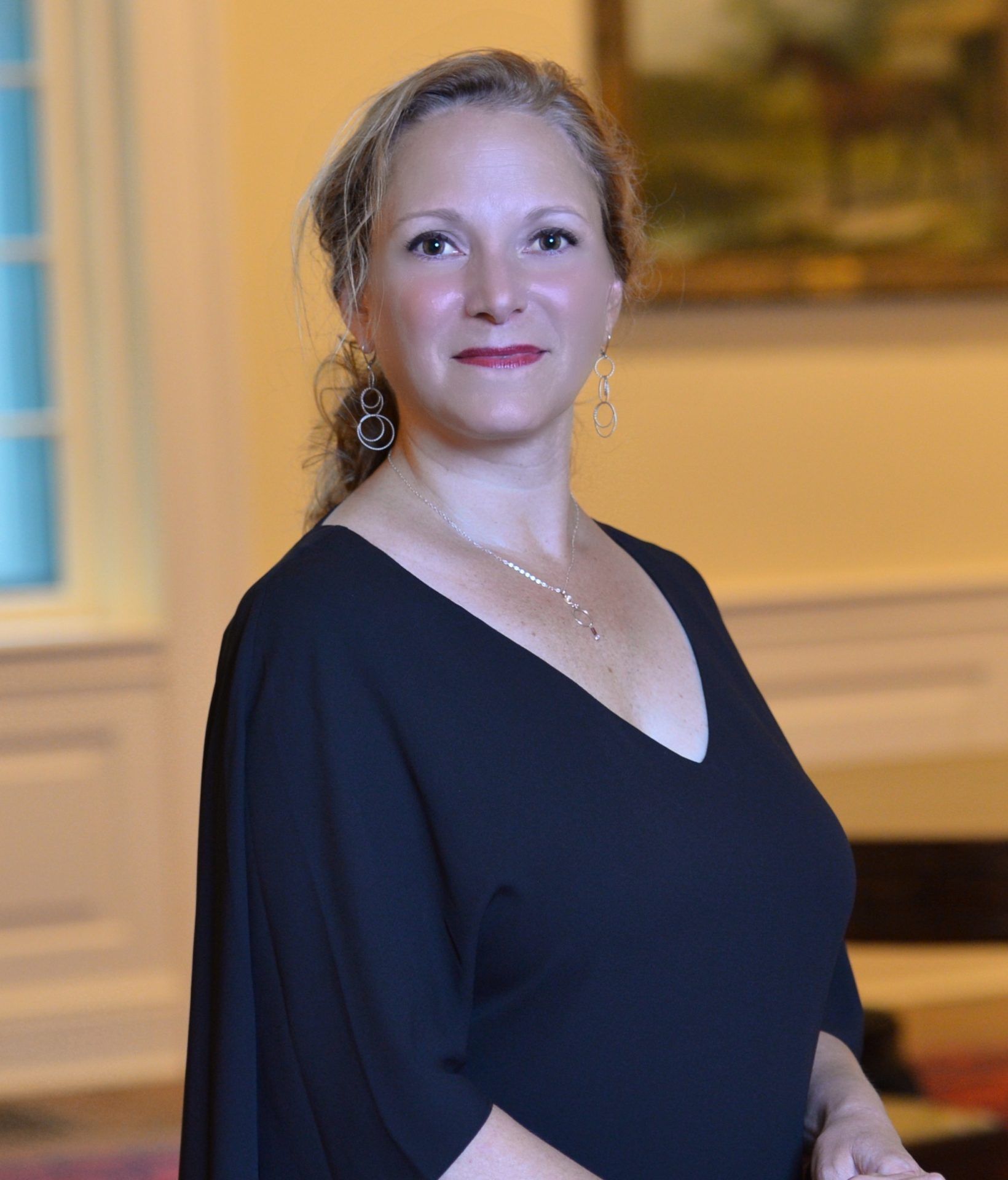 Headshot of woman by window